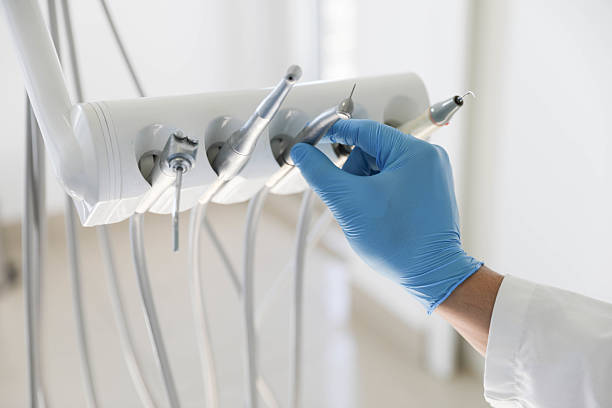 Professional Root Canal Treatment technician working in El Paso, TX